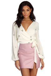 Spring Into Action Wrap Blouse
